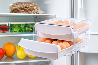 Which refrigerator egg tray container keeps eggs safer