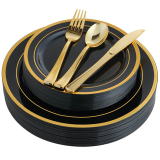 Jolly Chef Gold Rim Black&White Plastic Plates&Flatwares(25 sets) and gold utensils including a knife, fork, and spoon arranged neatly.