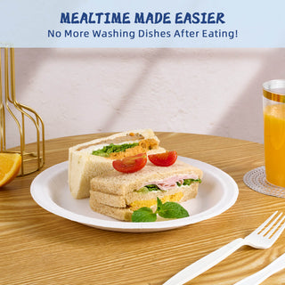 A jolly chef plate with two sandwiches topped with tomatoes, alongside a glass of orange juice, highlighting easy mealtime solutions.