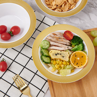 Jolly Chef’s yellow-patterned plates and a golden fork.