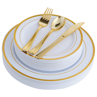 White and gold plastic plates with matching gold plastic fork, spoon, and knife for party or event.