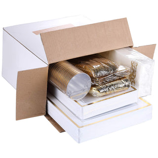 Box filled with disposable gold-trimmed plates, gold cutlery, and gold cups for a party.