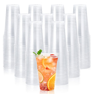 Bulk clear PET plastic cups filled with iced beverages, garnished with mint and fruit slices.