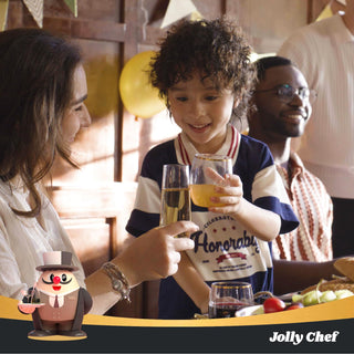 A child and an adult toast with drinks at a festive gathering，holding Jolly Chef Clear Stemless Gold Rim Plastic Wine Glasses, surrounded by decorations and food on a table.