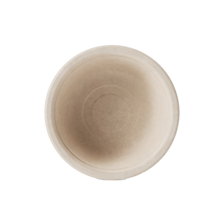 Aerial view of a simple, round, beige Jolly Chef compostable natural bowl with a smooth texture and minimalistic design, set against a black background.