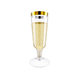 A sparkling Jolly Chef 5oz Clear Gold Rim Easy Grip Champagne Flutes filled with bubbly champagne, featuring a gold and silver rim, on a transparent base against a white background.