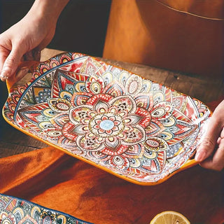 A Set Of Four Boho Style Ceramic Fish Plates