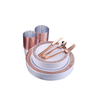 A set of elegant Jolly Chef plastic plates with rose gold trim, matching utensils, and silver cups, arranged for a refined dining experience.